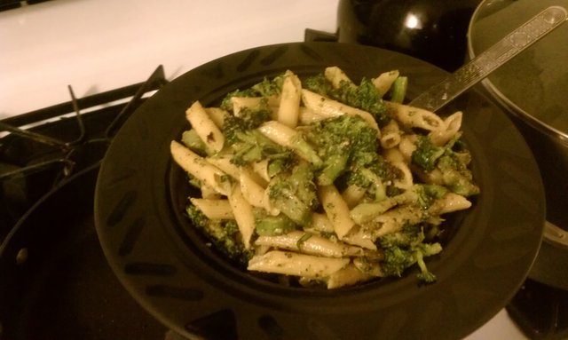 Sauteed broccoli and garlic tossed with penne and pesto.