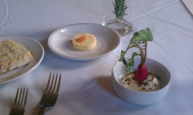 Butter pudding with French breakfast radish topped with crumbled porcini mushroom streudel.