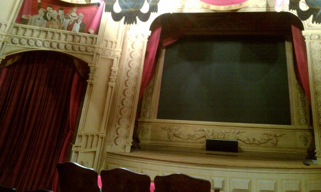 I had no idea there was a miniature theater in here.