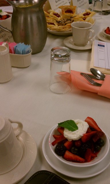 Fruit cup, pastries, and tasty breakfast bars from the culinary students.