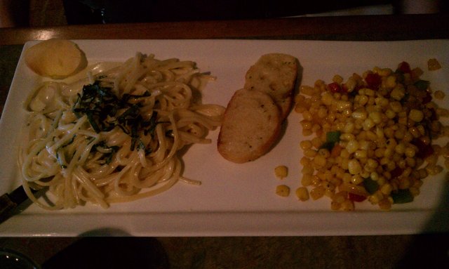 Pasta with white chocolate, cream, white wine, fresh basil sauce. Corn with bell peppers.