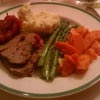 Beef tenderloin, lemon tarragon asparagus, mashed spuds with shallot butter, spiced applesauce, roasted carrots & onions.