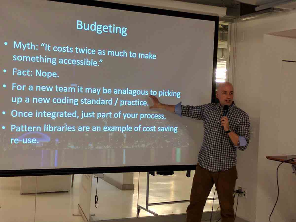 Adrian in front of his ‘Budgeting’ slide.