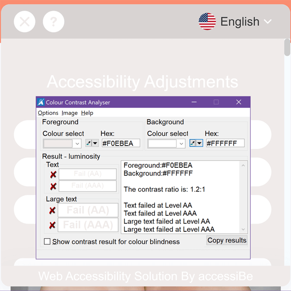 A color contrast analyzer showing the white text against the very light peach background has a contrast ratio of 1.2:1.